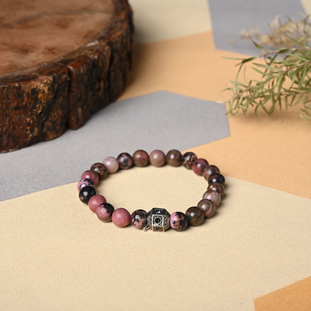 Gemstone Healing Bracelet Rhodonite helps in achieve goal ang good during time of transformation, it bring sympathy and empathy towards other - EarthBased