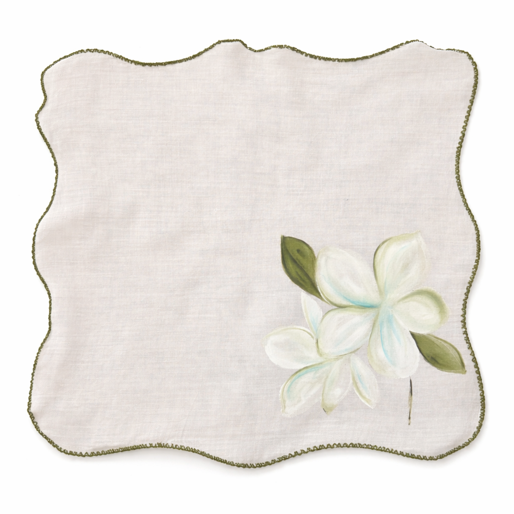 Cotton table napkins with colorful floral designs and scalloped edges, reusable dinner napkins designed for elegant dining table and home entertaining.