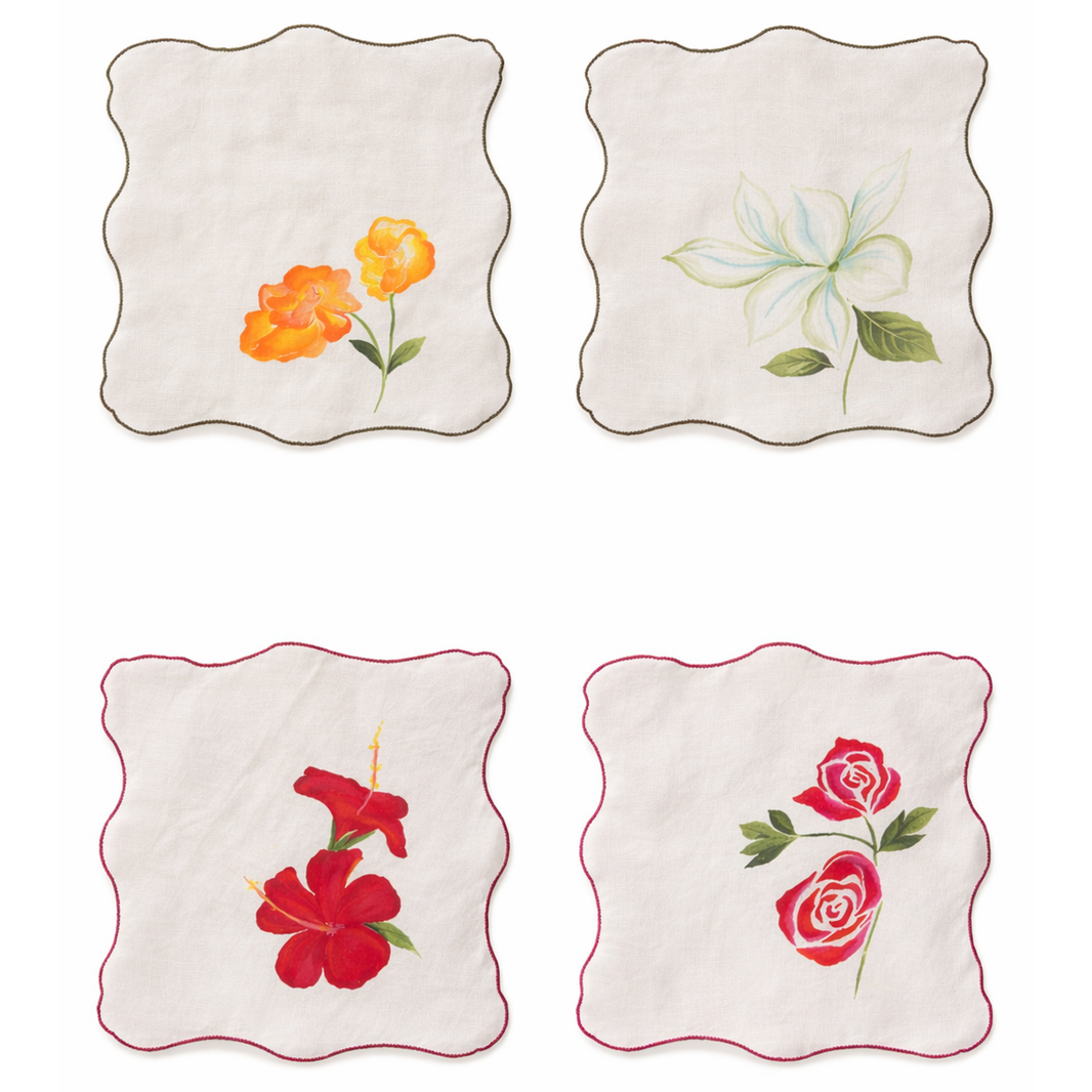 Set of cotton cloth napkins with hand painted floral motifs including hibiscus, rose and botanical flowers, decorative reusable napkins for dining table settings.