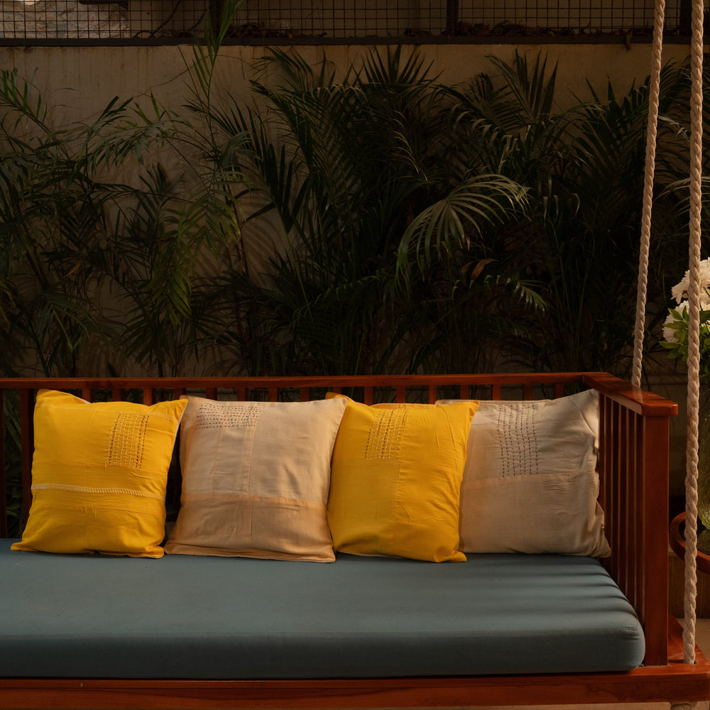Wooden swing with minimal stitched texture cotton cushion covers