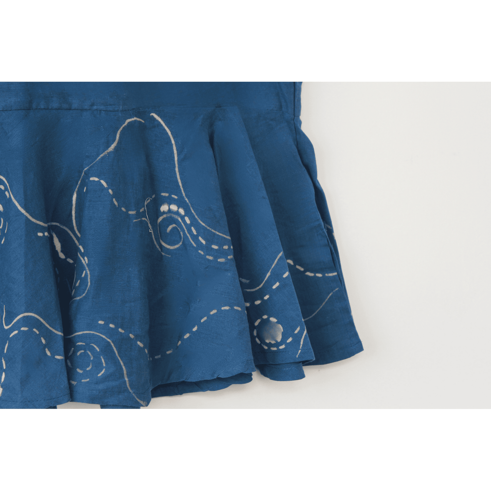 Blue cotton halter summer top inspired by the flowing movement of starry night, featuring stitched swirl detailing and a relaxed silhouette for warm weather outfits.