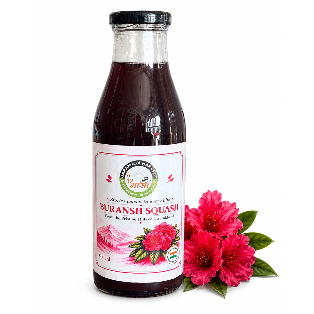 Baramasa Harvest Buransh Squash 500 ml bottle with red buransh flowers
