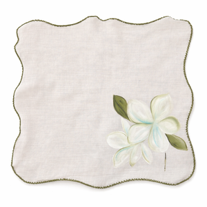 Cotton table napkins with colorful floral designs and scalloped edges, reusable dinner napkins designed for elegant dining table and home entertaining.