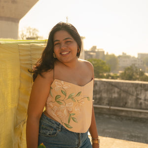 Peach corset top with floral Hand painted details and strapless neckline, inclusive corset blouse suitable for regular and plus size styling.