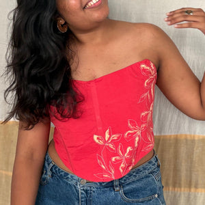 Cherry red floral embroidered corset top with strapless design, inclusive corset blouse suitable for both regular and plus size styling.