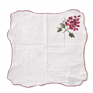 Reusable cotton cloth table napkins with fruit illustrations including lemon, orange, grapes and pomegranate, decorative napkins for dining table and brunch table settings.