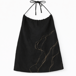 Black sleeveless strappy top with gold detailing, breathable cotton top styled with denim for casual summer outfits.