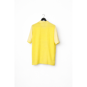 Back view of the yellow cotton Lime Shirt by JOD with hand-painted sun and wave motif
