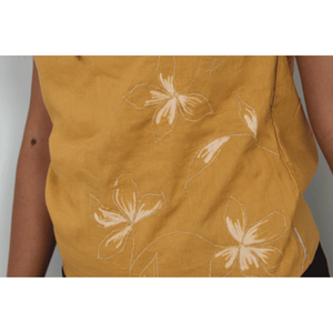Mustard casual summer top for women by JOD with floral embroidered details