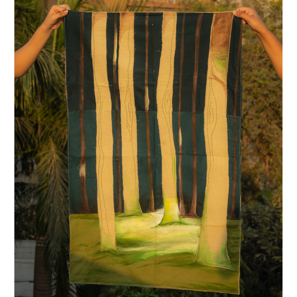 Hand painted textile wall art depicting a forest scene with tall trees and soft landscape tones, statement fabric wall decor for living rooms and studios.