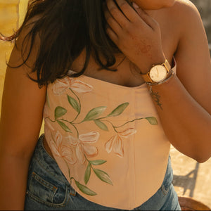 Peach floral corset top with embroidered detailing, party wear corset blouse designed for inclusive sizing and celebrations.