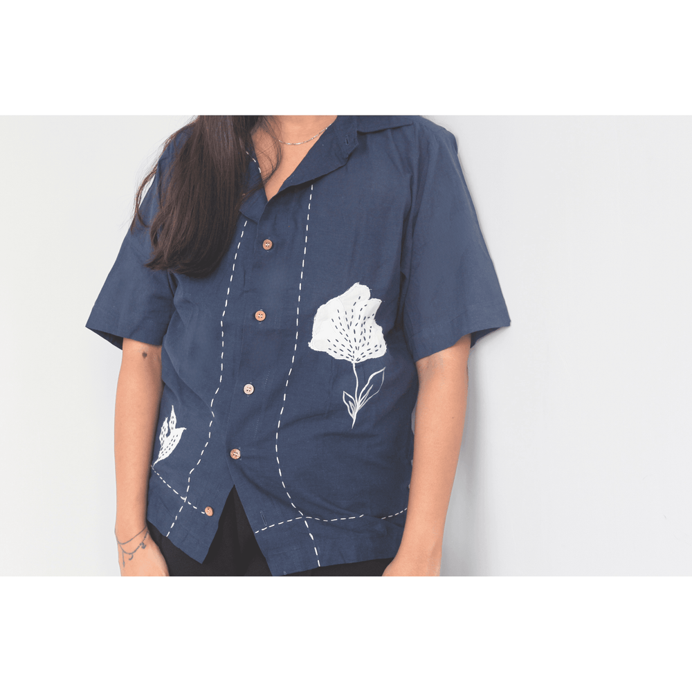 Navy blue relaxed fit shirt with white floral embroidery and patchwork