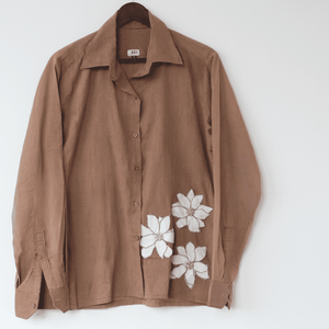 Ocassion wear beige shirt with white floral patterns with beaded details