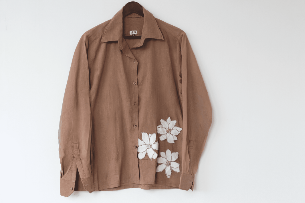Ocassion wear beige shirt with white floral patterns with beaded details